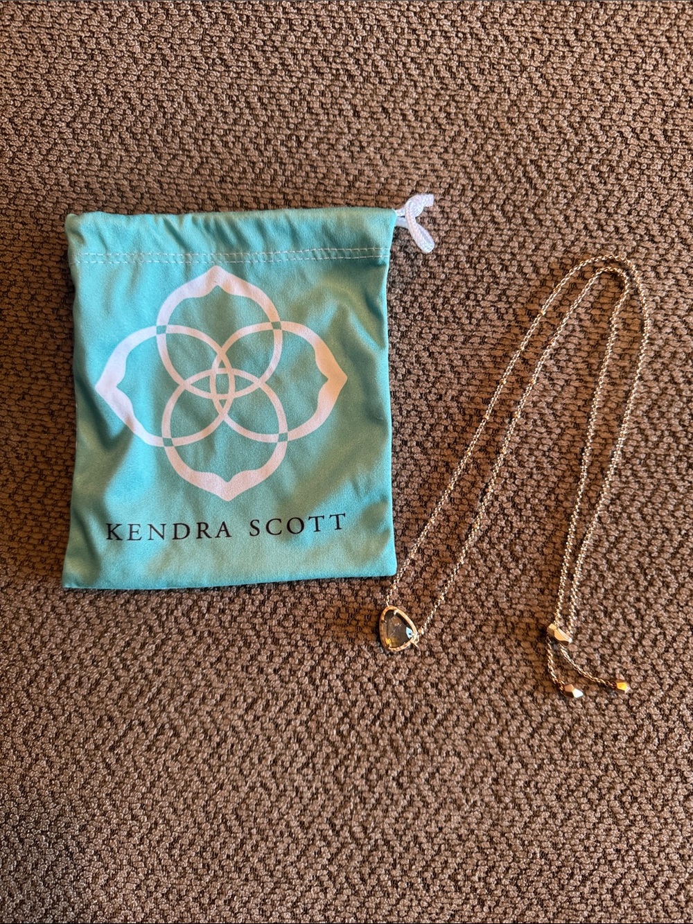 Kendra Scott Gold Teardrop Necklace with Aqua Pouch